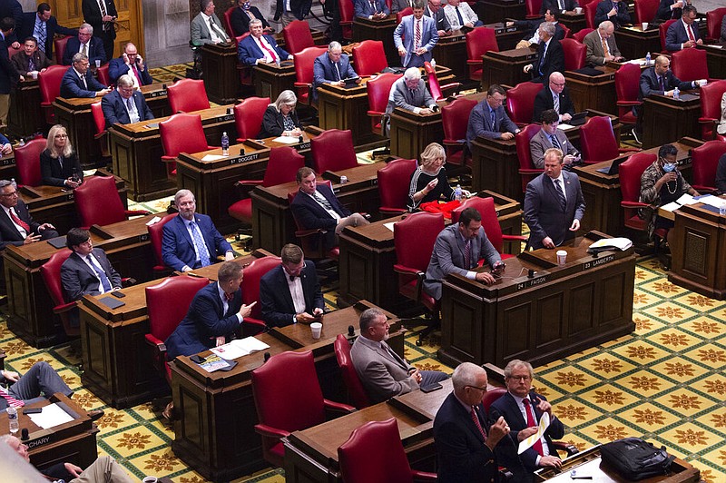 Tennessee lawmakers gather for a special session of the Tennessee General Assembly to take up incentives for Ford to create an electric vehicle manufacturing campus in West Tennessee, Monday, Oct. 18, 2021, at the State Capitol in Nashville, Tenn. (Stephanie Amador/The Tennessean via AP)