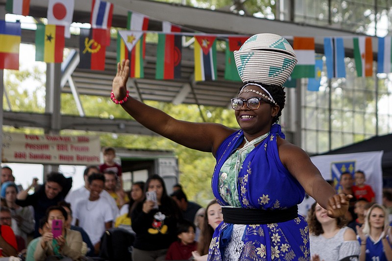 Staff File Photo / Representing the African country of Burundi, Visesiya Uwifashije dances during the 20th Annual CultureFest, displaying the area's diversity, at the Chattanooga Market at the First Tennessee Pavilion in 2019.