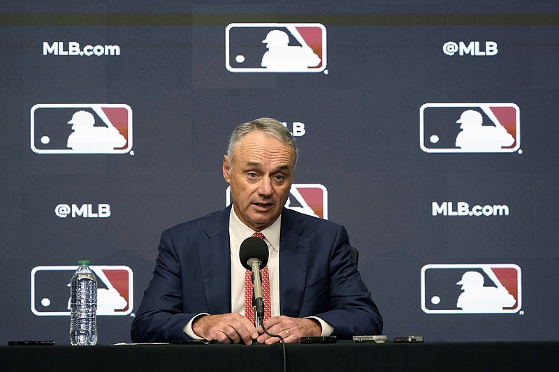 FILE - Major League Baseball commissioner Rob Manfred speaks during a news conference in Arlington, Texas, Thursday, Dec. 2, 2021. Major League Baseball and the players’ association are scheduled to meet Thursday, Jan. 13, 2022, in the first negotiations between the parties since labor talks broke off Dec. 1. The planning of the meeting was disclosed to The Associated Press by a person familiar with the negotiations who spoke on condition of anonymity because no announcement was made. (AP Photo/LM Otero, File)