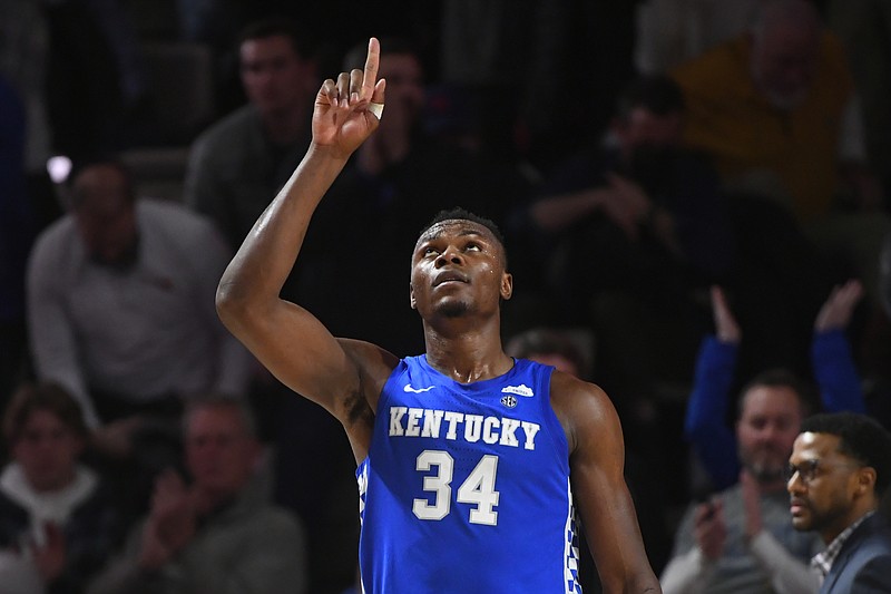 AP photo by John Amis / Kentucky forward Oscar Tshiebwe, shown as the Wildcats' 78-66 win against Vanderbilt comes to an end Tuesday night in Nashville, has per-game averages of 17 points and 15.1 rebounds this season. He had 13 rebounds to go with a career-high 30 points at Vanderbilt.