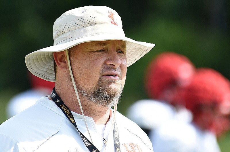 Staff photo by Matt Hamilton / Bo Campbell watches as Lakeview-Fort Oglethorpe's football team practices at the high school in early August. Campbell, who went 19-51 in seven seasons as the Warriors' head coach, has resigned from the position, citing a desire to spend more time with family.