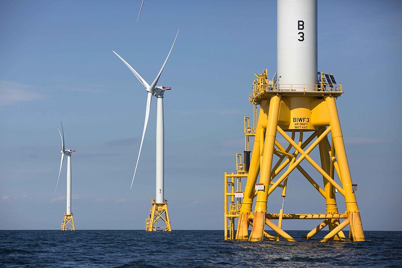 FILE - This photo from Aug. 15, 2016, shows offshore wind turbines near Block Island, R.I. The Biden administration said Wednesday it will hold its first offshore wind auction next month, offering nearly 500,000 acres off the coast of New York and New Jersey for wind energy projects that could produce enough electricity to power nearly 2 million homes. (AP Photo/Michael Dwyer, File)