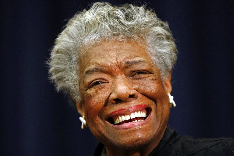 In this Nov. 21, 2008, file photo, poet Maya Angelou smiles at an event in Washington. On Monday, Jan. 10, 2022, the United States Mint said it has begun shipping quarters featuring the image of poet Maya Angelou, the first coins in its American Women Quarters Program. (AP Photo/Gerald Herbert, File)