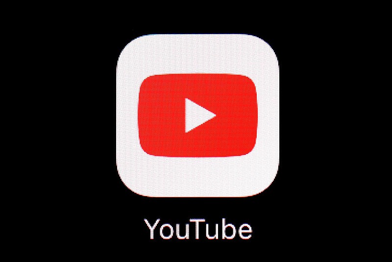 FILE - The YouTube app is shown on an iPad on March 20, 2018. A group of more than 80 fact checking organizations is calling on YouTube to address rampant misinformation on its platform. In a letter to CEO Susan Wojcicki published Wednesday, Jan. 12, 2022, the groups said the Google-owned video platform is "one of the major conduits of online disinformation and misinformation worldwide." (AP Photo/Patrick Semansky, File)