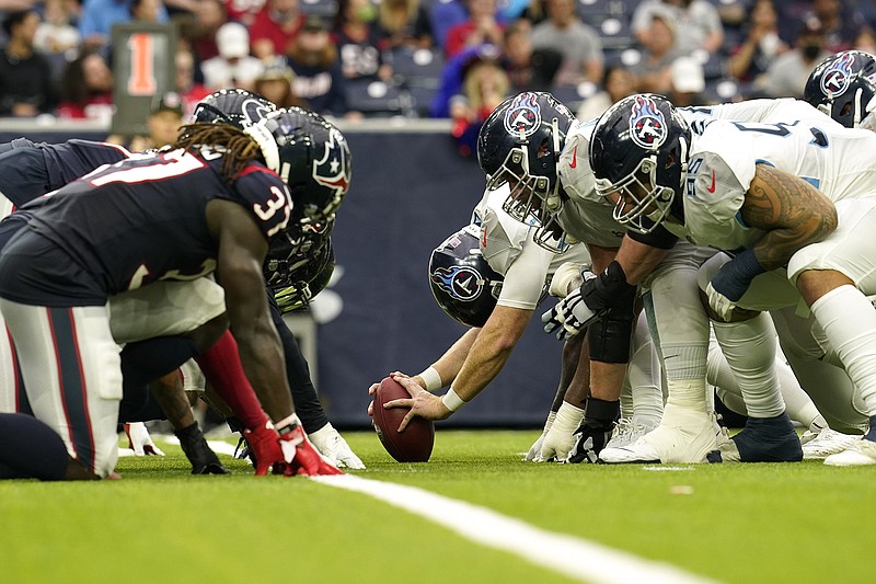 AP photo by Matt Patterson / The Tennessee Titans prepare to snap the ball during Sunday's game against the host Houston Texans.