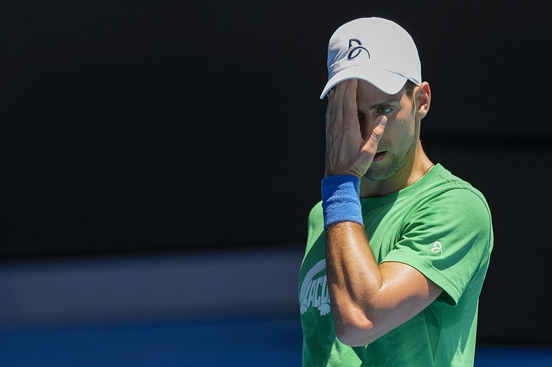 AP photo by Mark Baker / Novak Djokovic practices Thursday on Margaret Court Arena in Melbourne ahead of the Australian Open, which starts Monday.