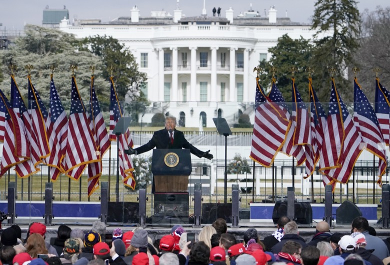 With the White House in the background, President Donald Trump speaks at a rally Wednesday, Jan. 6, 2021, in Washington. (AP Photo/Jacquelyn Martin)