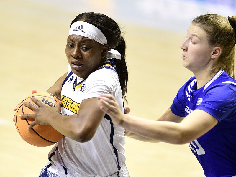 Staff file photo by Robin Rudd / UTC's Amaria Pugh, left, continued her recent run of double-digit scoring with 18 points in Saturday's 66-46 win at East Tennessee State.