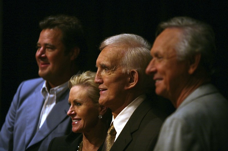 FILE - Tammy Genovese, second left, Country Music Association Chief Operating Officer, poses for a photo with Vince Gill, left, Ralph Emery and Mel Tillis, right, Tuesday, Aug. 7, 2007, in Nashville, Tenn., after it was announced that the three men will be inducted into the Country Music Hall of Fame. (AP Photo/Jeff Adkins, File)


