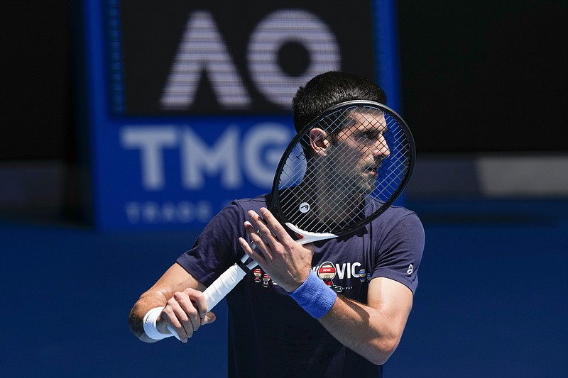 AP file photo by Mark Baker / Novak Djokovic practices at Rod Laver Arena last Wednesday in Melbourne ahead of the Australian Open. Djokovic is a three-time reigning champion at the year's first Grand Slam, but he won't be able to go for a fourth title in a row after losing an appeal to avoid being deported from Australia. The ruling came down Sunday, less than 24 hours before the major tournament begins.