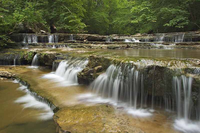 File photo/ Water pouring over rocks in Turkey Creek at the Walls of Jericho on the Tennessee-Alabama state line.