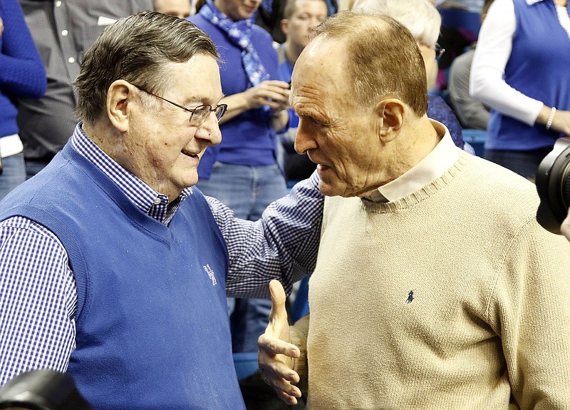 AP photo by James Crisp / Former SEC men's basketball coaches Joe B. Hall (Kentucky), left, and Dale Brown (LSU) talk as the Wildcats host the Tigers on March 5, 2016, in Lexington, Ky.