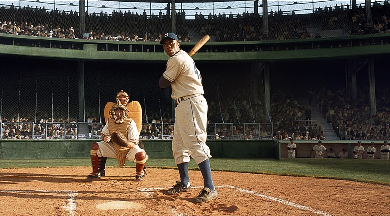 Dr. Martin Luther King, Jr., with Jackie Robinson on his right