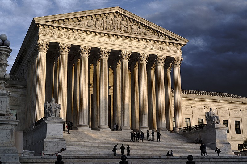 Photo by J. Scott Applewhite of The Associated Press / The Supreme Court is seen at dusk in Washington on Oct. 22, 2021.