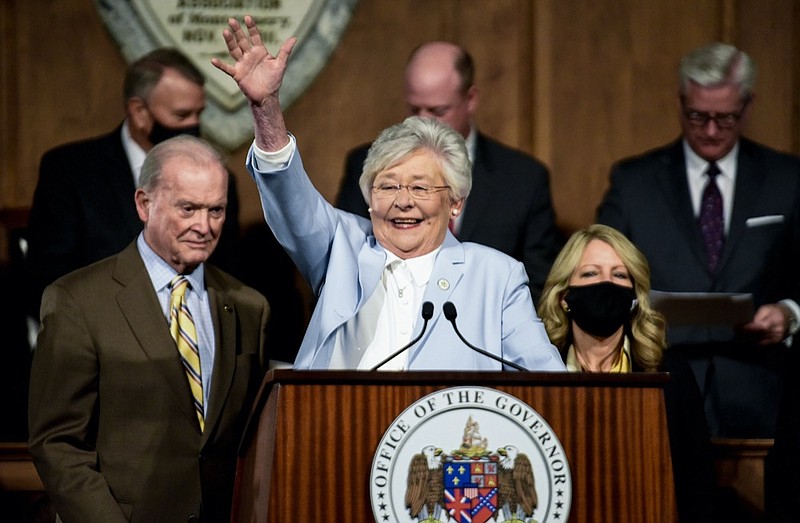 Alabama Gov. Kay Ivey waves as she arrives to deliver her State of the State address at the State Capitol Building in Montgomery, Ala., on Tuesday, Jan. 11, 2022. (Mickey Welsh/The Montgomery Advertiser via AP)


