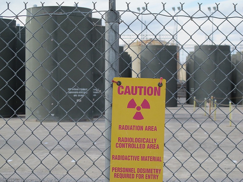 Steel and concrete containers used for dry storage of spent fuel at the Tennessee Valley Authority's Sequoyah nuclear plant near Chattanooga, Tenn., are shown to the media during a Friday Jan. 13, 2012 tour. As climate change pushes states in the U.S. to dramatically cut their use of fossil fuels, many are coming to the conclusion that solar, wind and other renewable power sources won't be enough to keep the lights on. Nuclear power is emerging as an answer to fill the gap as states transition away from coal, oil and natural gas to reduce greenhouse gas emissions and stave off the worst effects of a warming planet. (AP Photo/ Bill Poovey, File)