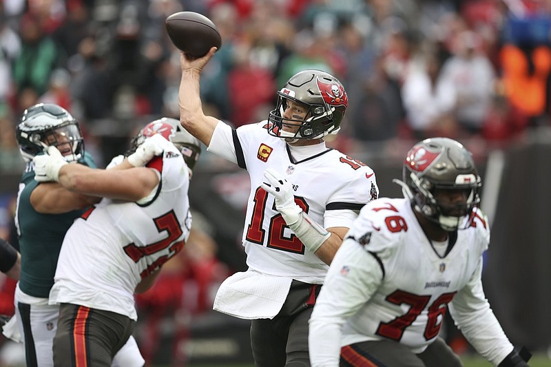 Tampa Bay Buccaneers quarterback Tom Brady (12) throws a pass against the Philadelphia Eagles during the second half of an NFL wild-card football game Sunday, Jan. 16, 2022, in Tampa, Fla. (AP Photo/Mark LoMoglio)