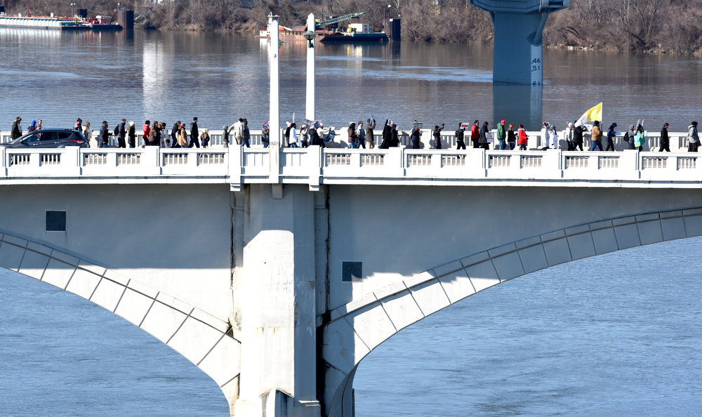 Staff Photo by Robin Rudd / Saturday's March for Life strings out as it crosses the Market Street Bridge. The rally against abortion by Greater Chattanooga Right to Life marched from Coolidge Park across the Walnut Street Bridge, to the Market Street Bridge and ending at Coolidge Park.