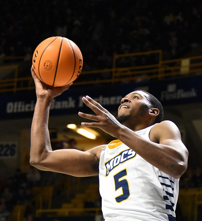 Staff file photo by Matt Hamilton / Darius Banks scored 10 points and grabbed seven rebounds as UTC made some big plays late to win 78-74 on Saturday at VMI.