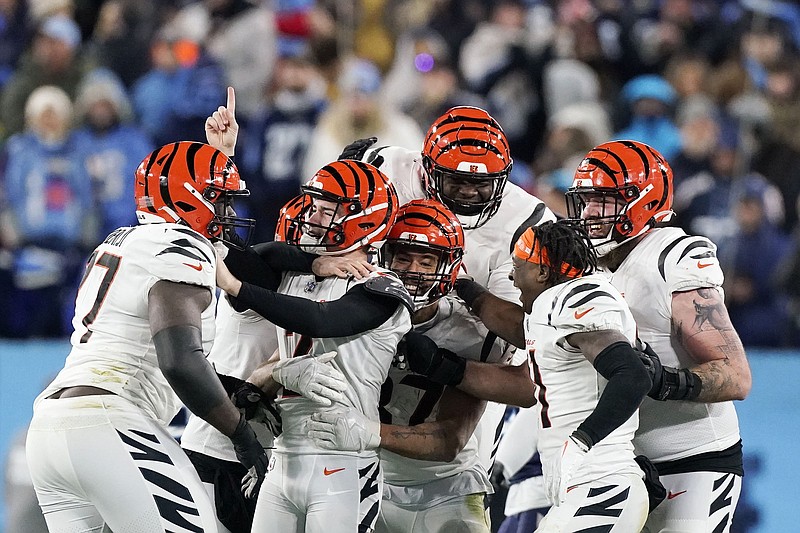 AP photo by Mark Humphrey / Cincinnati Bengals kicker Evan McPherson points his finger as he celebrates after kicking a 52-yard field goal to beat the Tennessee Titans 19-16 in a playoff game Saturday in Nashville. McPherson, a rookie who is from Fort Payne, Alabama, played at the University of Florida and was the only kicker taken in the 2021 NFL draft.
