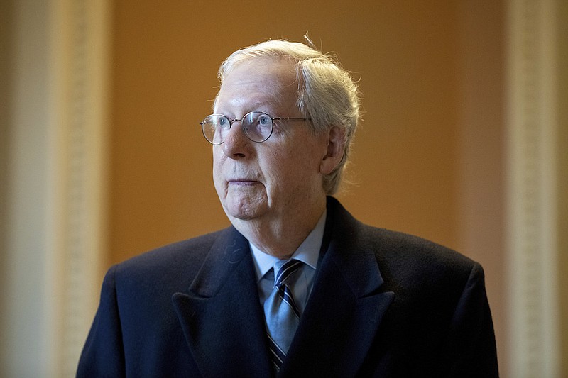 Senate Minority Leader Mitch McConnell, R-Ky., speaks to a reporter at the Capitol in Washington, Wednesday, Jan. 19, 2022. (AP Photo/Amanda Andrade-Rhoades)