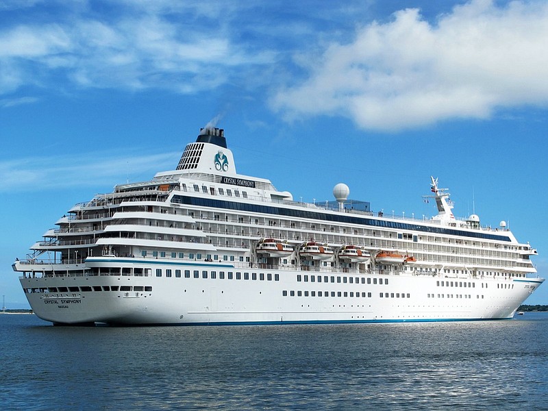 FILE - The cruise liner Crystal Symphony leaves the harbor in Charleston, S.C. on May, 21, 2013. Scheduled to arrive in Miami on Saturday, Jan. 22, 2022, the ship, with hundreds of passengers aboard, was diverted to the Bahamas after a U.S. judge granted an order to seize the vessel as part of a lawsuit over unpaid fuel. (AP Photo/Bruce Smith, File)