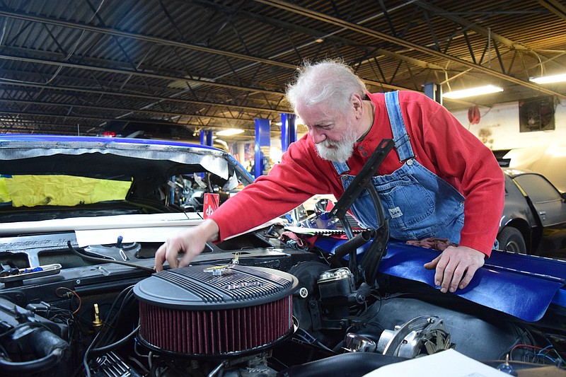 Staff Photo by Robin Rudd / David Norwood works on a 1967 Camero at Brothers Automotive, located in Hixson, on January 21, 2022.  