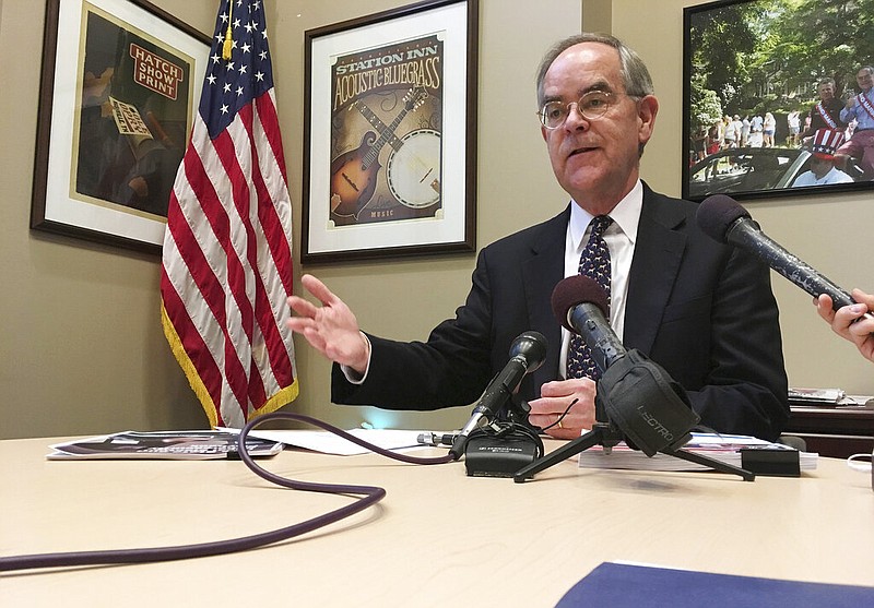 U.S. Rep. Jim Cooper, D-Nashville, talks to reporters at his Nashville office, Feb. 16, 2018. Tennessee Republican lawmakers have approved a plan to carve fast-growing Nashville into multiple congressional seats. (AP Photo/Jonathan Mattise)