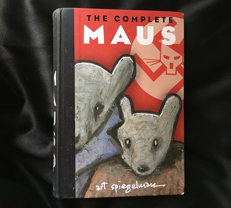 The cover of "The Complete Maus," a novel by Art Spiegelman that tells the story of Vladek Spiegelman's experience of surviving in Hitler's Europe. / Staff photo by Kim Sebring