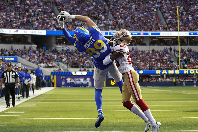 AP photo by Marcio Jose Sanchez / Los Angeles Rams tight end Tyler Higbee touchdown pass while covered by San Francisco 49ers cornerback Ambry Thomas during the regular-season finale on Jan. 9 in Inglewood, Calif.