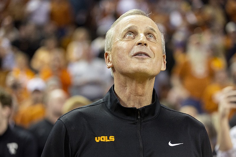 AP photo by Stephen Spillman / Tennessee men's basketball coach Rick Barnes watches a welcome back video before his Vols take on the host Texas Longhorns in a Big 12/SEC Challenge game on Saturday night in Austin.