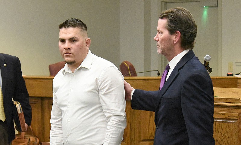 Staff Photo by Matt Hamilton / Hugo Garcia Padilla, left, leaves the courtroom with his lawyer Caldwell Huckabee on Tuesday, February 1, 2022 at the courthouse at Soddy-Daisy City Hall.