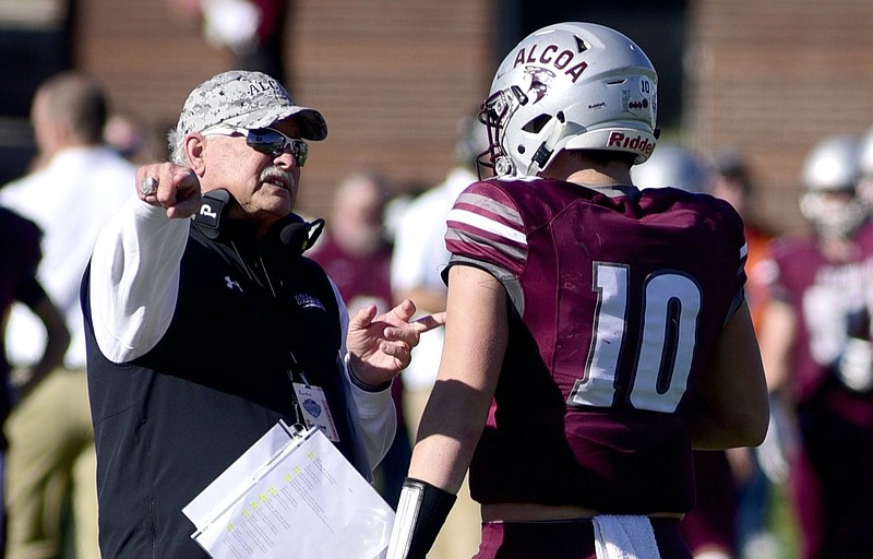 Staff photo by Robin Rudd / Alcoa football coach Gary Rankin instructs quarterback Caden Buckles (10) during the Tornadoes' 45-14 win against East Nashville in the TSSAA Class 3A BlueCross Bowl state title game on Dec. 3 at Finley Stadium.