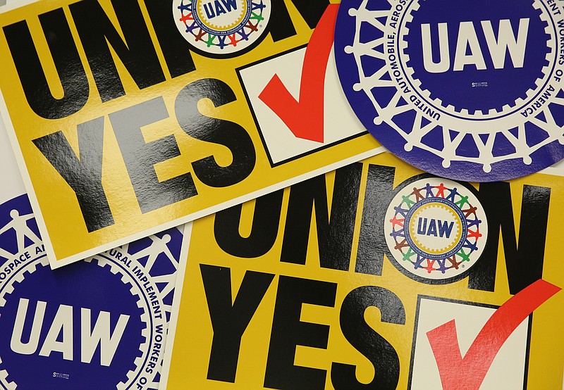 Staff file photo by Erin O. Smith / The Chattanooga Times Free Press - In 2014, signs encouraging workers to vote yes for the United Auto Workers labor union lined the walls inside the Chattanooga Electrical Apprenticeship and Training Center while workers wait nearby in the International Brotherhood of Electrical Workers building to hear the outcome of their votes in Chattanooga. The union was rebuffed.