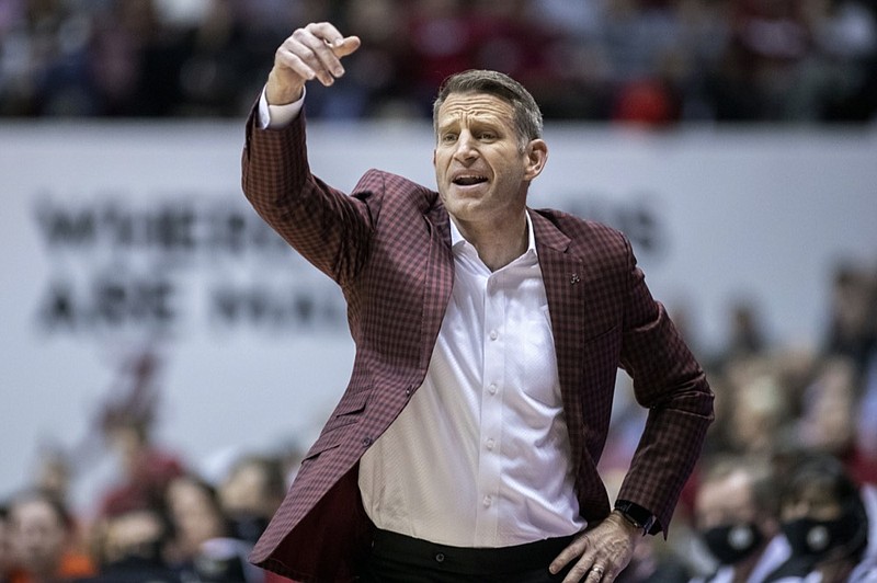 AP photo by Vasha Hunt / Alabama men's basketball coach Nate Oats signals during a home game against in-state and SEC rival Auburn on Jan. 11.