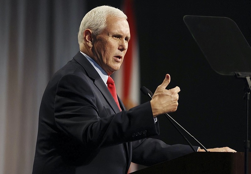 Former Vice President Mike Pence speaks at the Florida chapter of the Federalist Society's annual meeting at Disney's Yacht Club resort in Walt Disney World on Friday, Feb. 4, 2022, in Lake Buena Vista, Fla. (Stephen M. Dowell/Lake Buena Vista Sentinel via AP)



