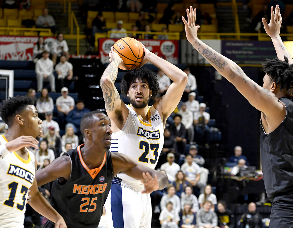 Staff Photo by Robin Rudd / UTC's Avery Diggs (23) looks to pass. The University of Tennessee at Chattanooga Mocs hosted the Mercer Bears in Southern Conference basketball, at McKenzie Arena, on February 5, 2022.