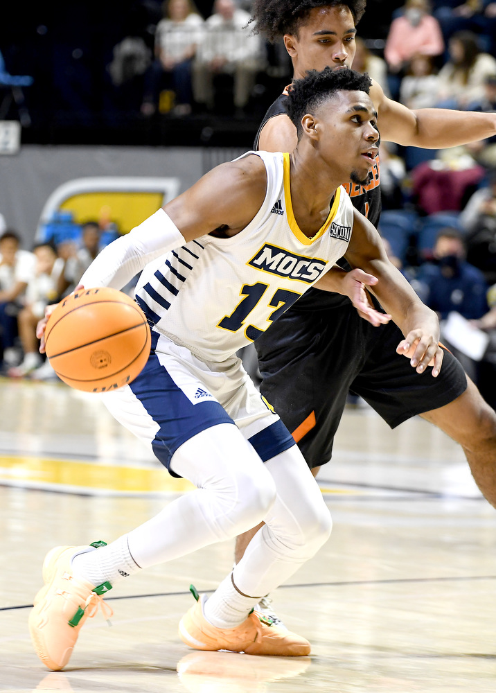 Staff Photo by Robin Rudd / UTC's Malachi Smith (13) dribbles toward the basket. The University of Tennessee at Chattanooga Mocs hosted the Mercer Bears in Southern Conference basketball, at McKenzie Arena, on February 5, 2022.