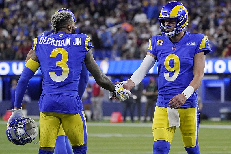 AP photo by Mark J. Terrill / Los Angeles Rams wide receiver Odell Beckham Jr., who played at LSU, and quarterback Matthew Stafford, who played at Georgia, celebrate during their wild-card playoff victory against the Arizona Cardinals on Jan. 17 in Inglewood, Calif. Beckham and Stafford are among several former SEC stars who will take part in Sunday's Super Bowl, either with the Rams or their opponent, the Cincinnati Bengals.