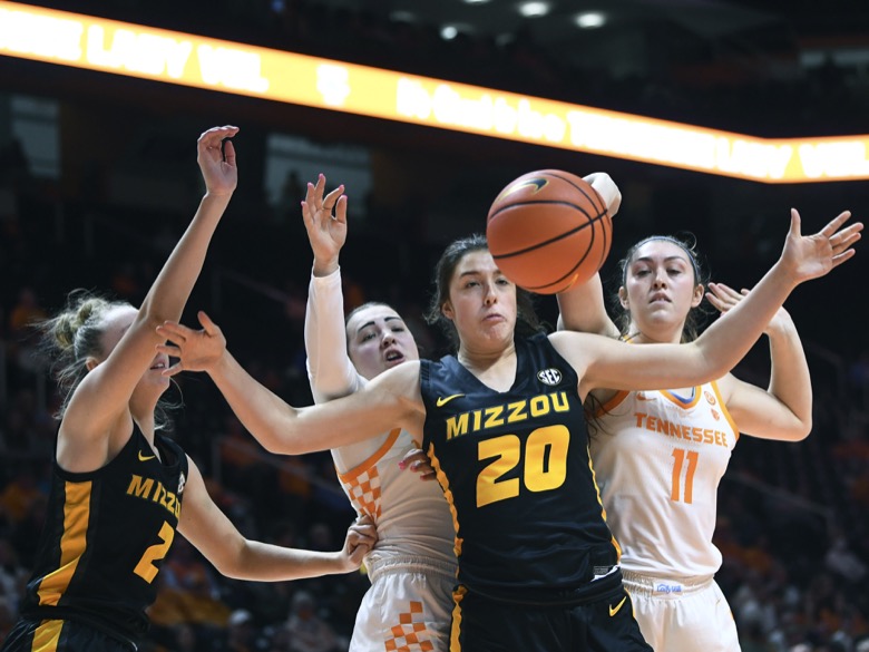 Missouri forward Sarah Linthacum (20) goes after the rebound along with Tennessee guard Jessie Rennie (10) and forward Karoline Striplin (11) during the NCAA women's basketball game between the Tennessee Lady Vols and Missouri Tigers in Knoxville, Tenn. on Thursday, February 10, 2022. Mandatory Credit: Saul Young/ Knoxville News Sentinel via USA TODAY NETWORK