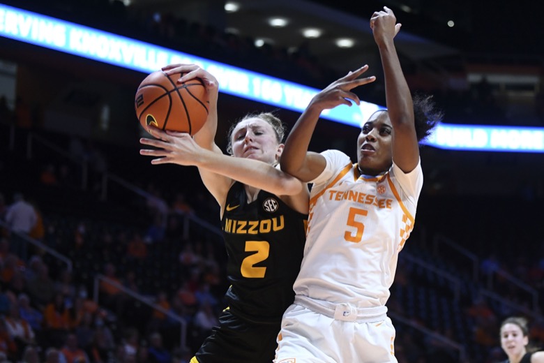 Missouri guard Sara-Rose Smith (2) gets the rebound over Tennessee guard Kaiya Wynn (5) during an NCAA college basketball game, Thursday, Feb. 10, 2022 in Knoxville, Tenn.(Saul Young/Knoxville News Sentinel via AP)