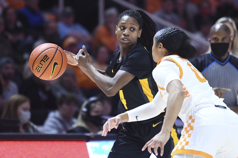 Missouri guard Mama Dembele (4) is guarded by Tennessee guard Brooklynn Miles (0) during an NCAA college basketball game, Thursday, Feb. 10, 2022 in Knoxville, Tenn.(Saul Young/Knoxville News Sentinel via AP)