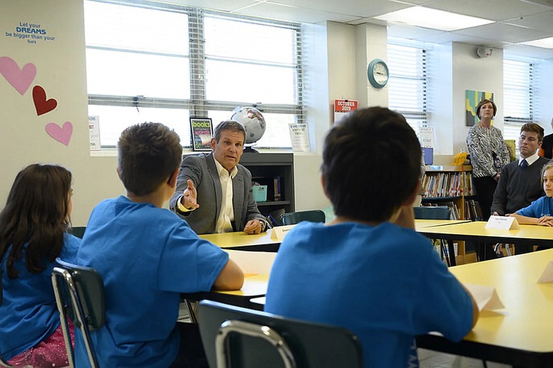 Gov. Bill Lee speaks with elementary school students in 2019 in a school library in Henderson, Tennessee. / Photo by Theresa Montgomery / State of Tennessee