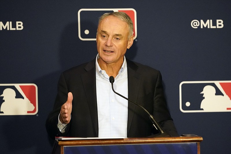 MLB commissioner Rob Manfred makes comments during a news conference at MLB baseball owners meetings, Thursday, Feb. 10, 2022, in Orlando, Fla. (AP Photo/John Raoux)