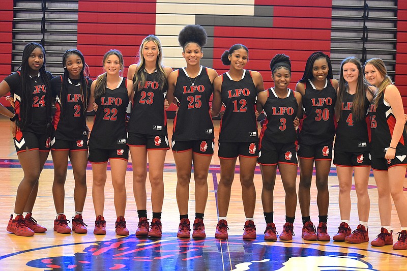 Staff photo by Patrick MacCoon / The Lakeview-Fort Oglethorpe varsity girls' basketball team has 10 sisters on the roster this season. From left are those five sets of sisters: Christina Collins, Christen Collins, Skye Alexander, Star Alexander, Ziara Thompson, Mercedes Thompson, Princess Simmons, Angel Simmons, Piper Piatt and Presley Piatt.