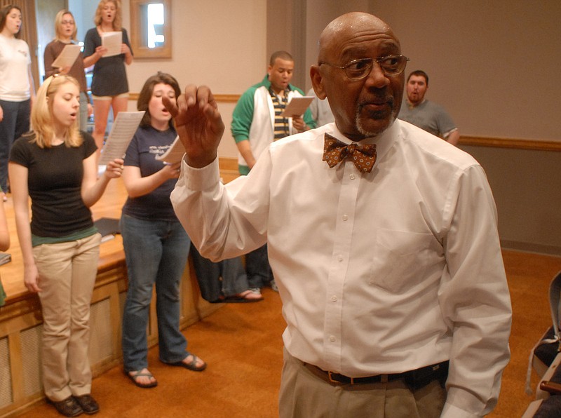 Staff File Photo / Roland Carter directs the University of Tennessee at Chattanooga Chamber Singers during a rehearsal in Cadek Hall.