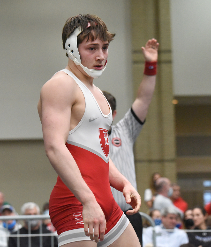 Staff photo by Matt Hamilton / Baylor's Garrison Dendy leaves the mat after defeating Father Ryan's Ben Stigamier in the 145-pound final at the TSSAA Division II state traditional tournament at the Chattanooga Convention Center on Feb. 25, 2021.