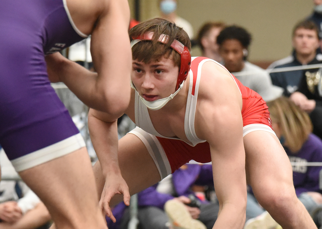 Staff photo by Matt Hamilton / Baylor's Garrison Dendy wrestles Father Ryan's Ben Stigamier in the 145-pound final at the TSSAA Division II state traditional tournament at the Chattanooga Convention Center on Feb. 25, 2021.