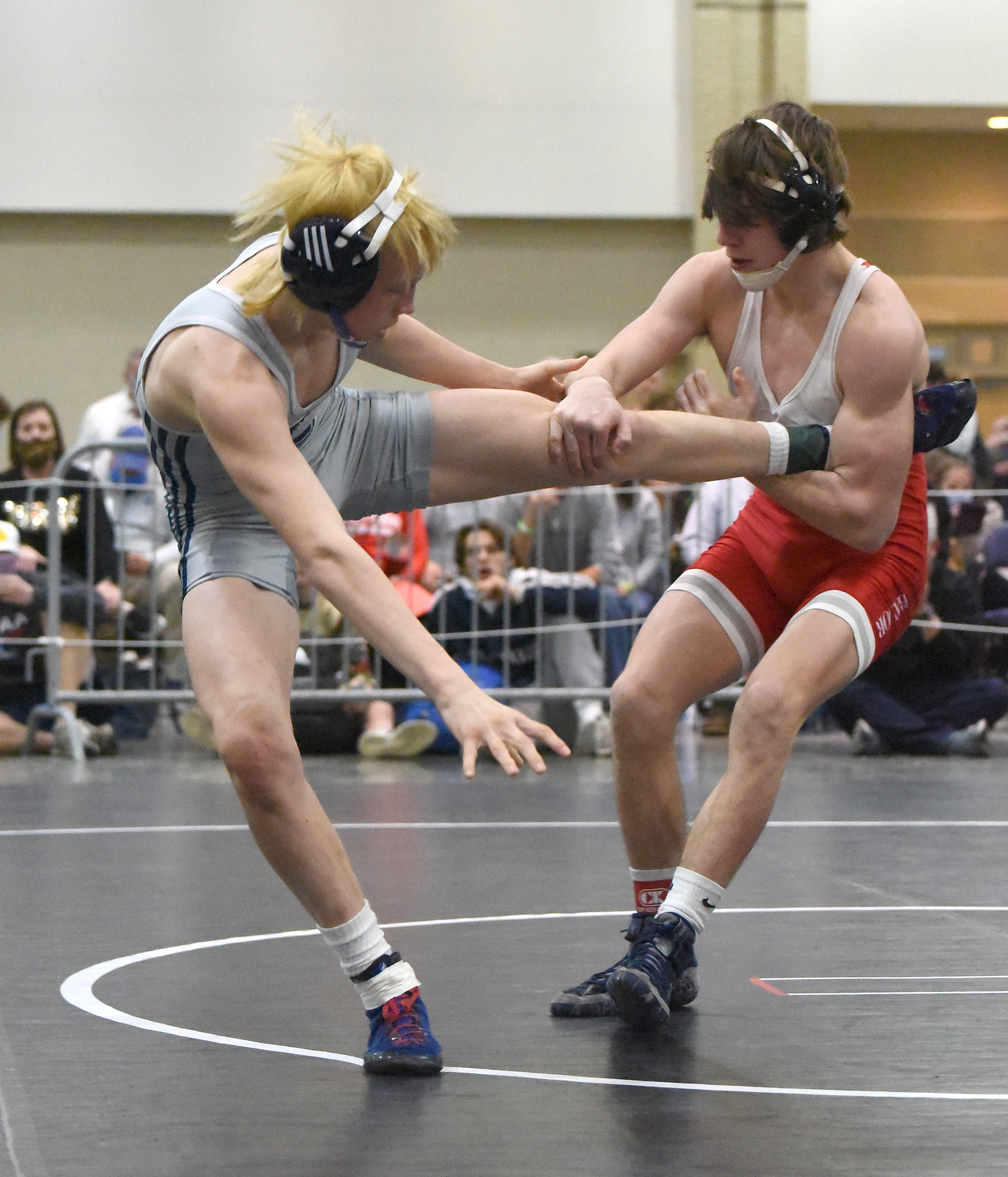 Staff photo by Matt Hamilton / Baylor's Nick Corday, right, wrestles Lakeway Christian's Jay Eversole in the 113-pound final at the TSSAA Division II state traditional tournament at the Chattanooga Convention Center on Feb. 25, 2021.