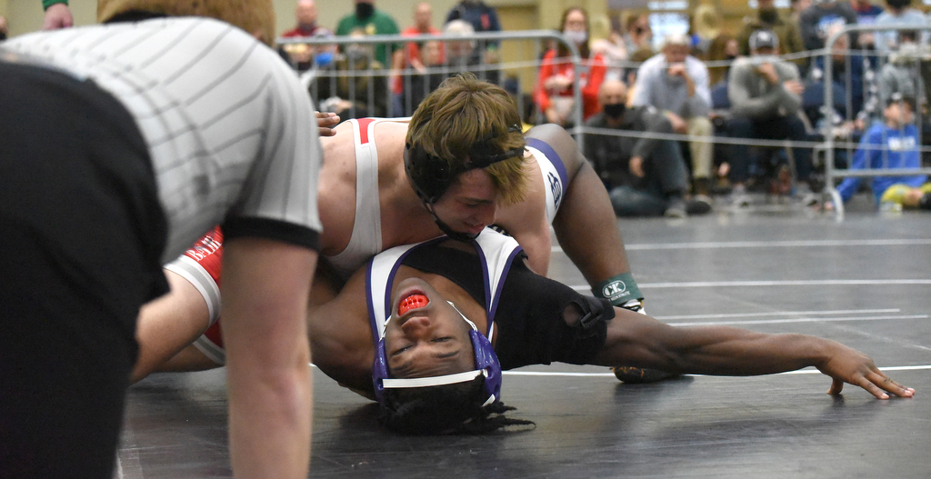 Staff photo by Matt Hamilton / Baylor's David Harper, top, wrestles Christian Brothers' Theo Sewell in the 195-pound final at the TSSAA Division II state traditional tournament at the Chattanooga Convention Center on Feb. 25, 2021.